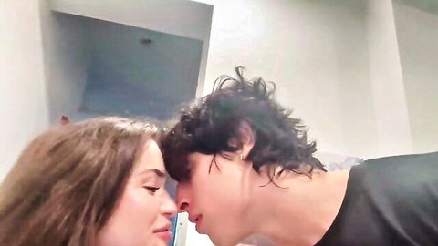 Moroccan hottie in intimate nose-touch with curly-haired lover