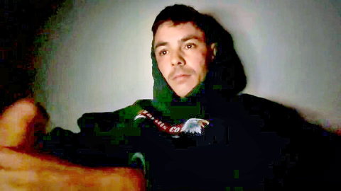Latino twink in Eagles hoodie leaning back teasing