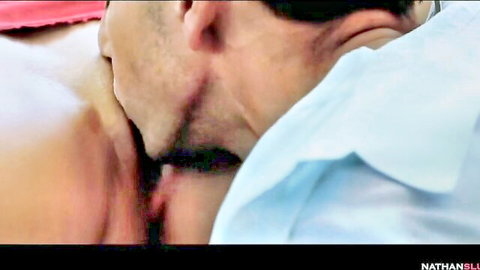Passionate skinny Hungarian MILF kissing man's neck in steamy foreplay embrace