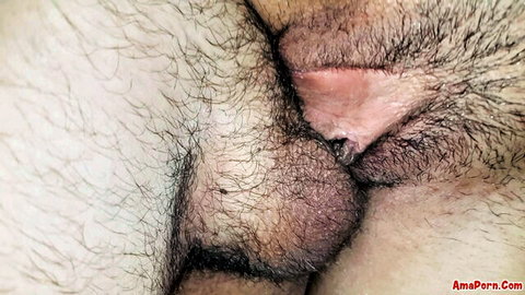 Close-up of two hairy men's genitals during intimate wedding sex