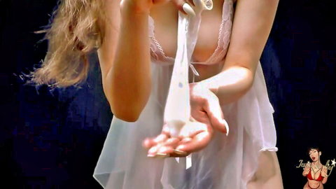 Blonde in sheer lingerie holding cum rag for CEI cuckold fantasy
