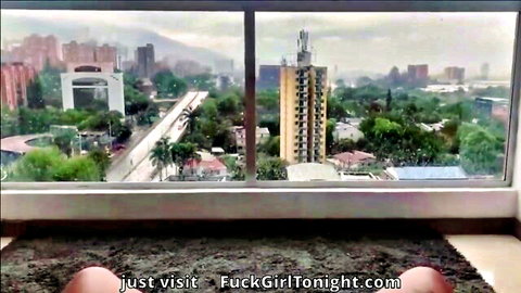 POV roommate fucks by big window with city and neighbor view