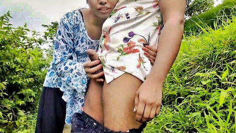 Desi Bhabhi lifting floral dress outdoors on farm with lover