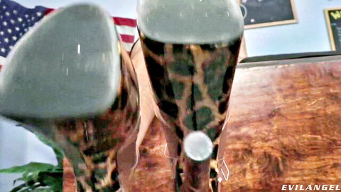Leopard print high heels soles up close, foot fetish tease