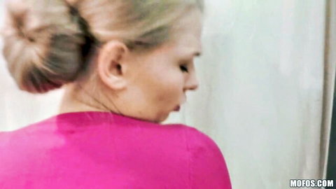 Blonde MILF Lucy Heart in pink top, seductive profile view POV tease