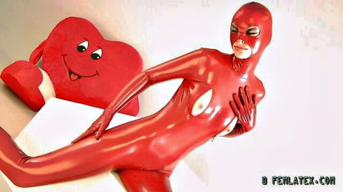 Kinky babe in shiny red latex catsuit with exposed tits, teasing pose