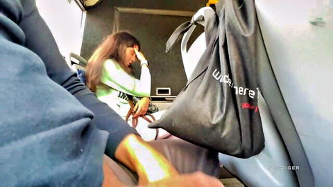 Stranger girl in green sweater gives handjob on crowded public bus