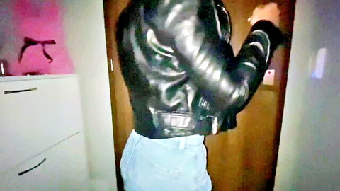 Slutty Greek babe in tight denim shorts and leather jacket, teasing from behind