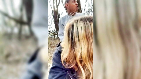 Blonde woman and black guy on outdoor park walk, amateur tease