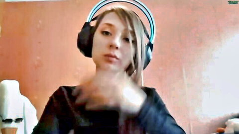 Lucy Blush blonde webcam amateur in black top and headphones