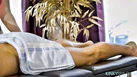 Paige Owens giving sensual massage to client in erotic spa scene