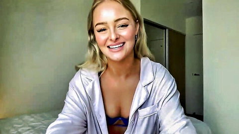 Bbybreex blonde in open silver robe and blue bra, teasing big boobs on Chaturbate