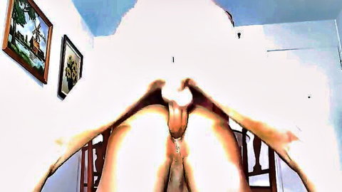Close-up of spread thighs exposing pussy in white fuzzy outfit