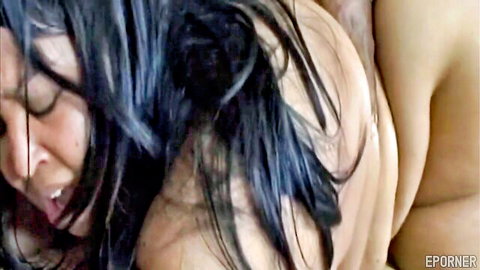 Close-up of black BBW with dark hair in ecstatic oral sex pose, nude curves