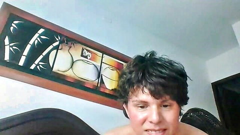 Curly-haired teen Dios1509 in gay fingering video, shirtless smile