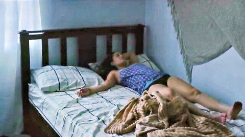 Max Eigenmann sexy relaxed pose on bed in tank top and shorts, 12 Weeks (2022)