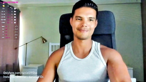 Muscular Latino model Daniel0910s smiling in tight white tank top, solo tease