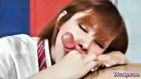 Japanese shemale in school uniform giving intense blowjob