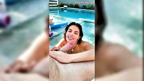 Alexa Pearl topless in pool, smiling with pink dildo toy