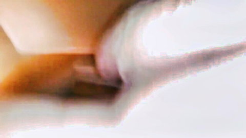 Married woman lying on bed during intense anal penetration by partner