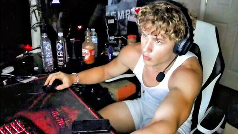 Muscular gamer Maxednat in white tank top and shorts, curly hair, alpha vibe