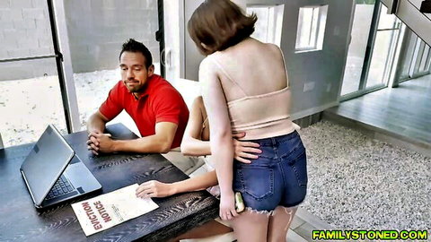 Stepmom in tiny denim shorts gropes stepson's crotch at desk from behind