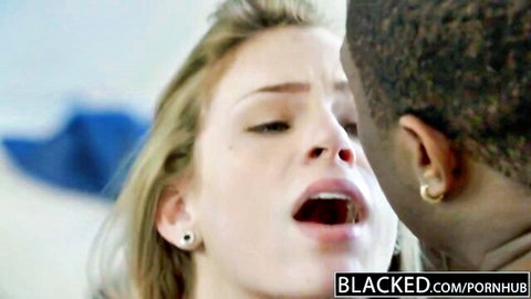Young blonde with mouth wide open sucking huge BBC in closeup interracial blowjob