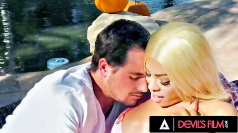 Krissy Lynn in steamy poolside embrace with handsome stud