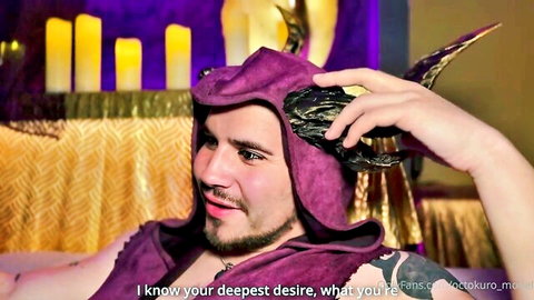 Seductive bearded man in purple horned hood teases deepest desires