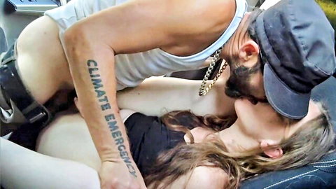 Bearded older man with 'climate emergency' tattoo passionately kisses petite brunette during missionary car sex