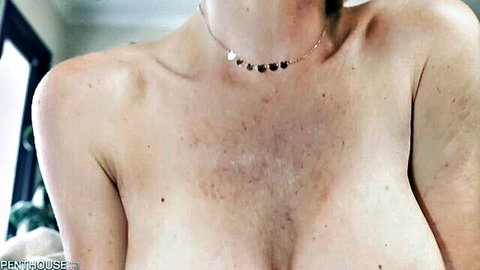 Kit Mercer topless with large natural breasts and beaded necklace