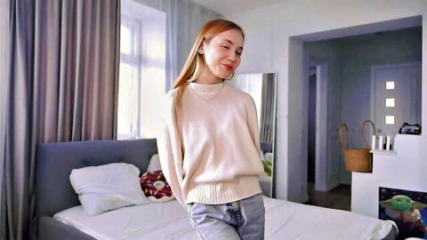 Blue_bow cute redhead teen camgirl posing in sweater and jeans, Chaturbate solo