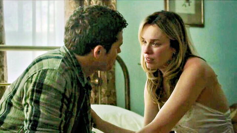 Jessica McNamee in intimate bedroom talk with man, white slip lingerie, The Visitor 2022