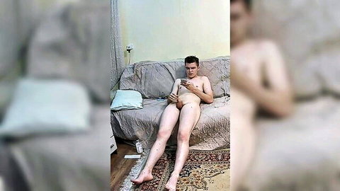 Straight guy masturbating to straight porn on couch solo