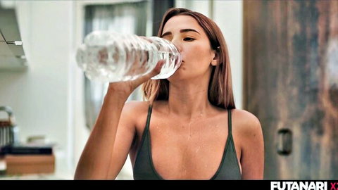Agatha Vega drinking water in sweaty green tank top, seductive look