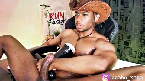Muscular Black stud Jacobo in cowboy hat strokes massive BBC with fleshlight solo