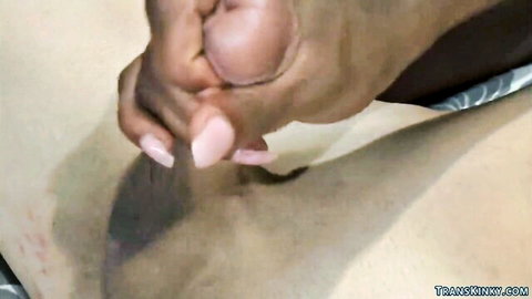 Black T-girl handjob on white man's cock in intense anal scene
