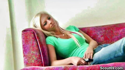 Pretty German blonde Nina lounging in green top and jeans