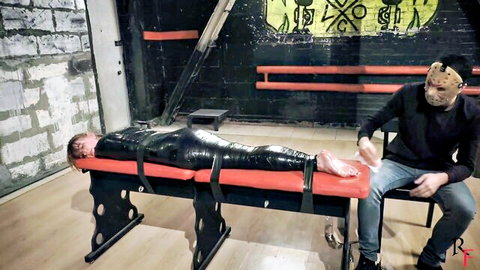 Katrina mummified in black tape, bound and tickled on bare soles in fetish scene