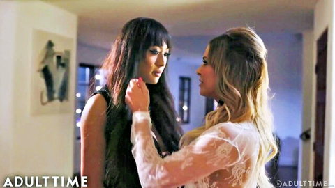 Venus Lux and Cherie DeVille in passionate face touch, erotic lesbian embrace
