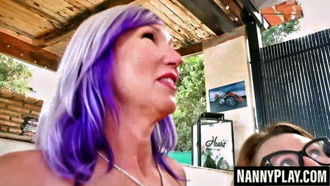 Melody Charm with purple hair and JoJo Robinson glasses intimate GILF lick scene
