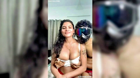 Resmi R Nair teasing cleavage in white bra, Indian beauty with man