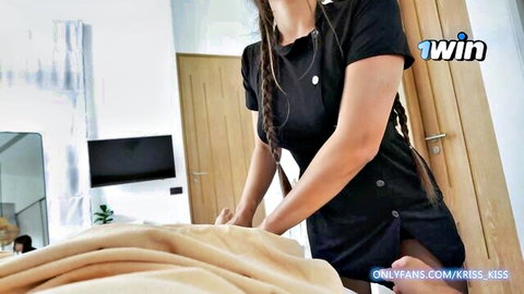 Kris Kiss in sexy black dress teasing on bed
