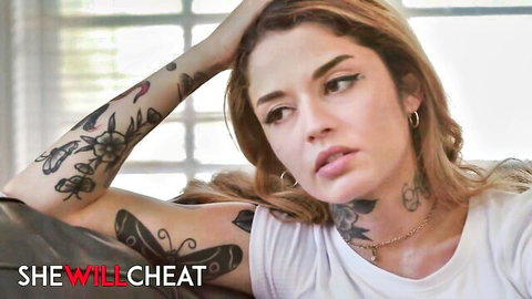 Tattooed brunette Vanessa Vega lounging seductively in white tee