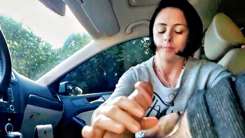 Latina woman gives handjob to thick erect cock in car POV
