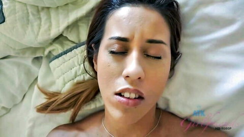 Brunette babe's ecstatic face with open mouth moaning in pleasure during intense POV sex