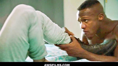 Andre Donovan holds Adam Ramzi's leg in interracial gay foreplay, Disruptive Films