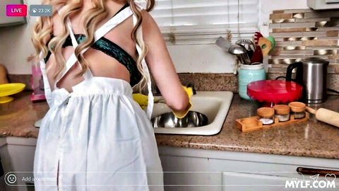 Blonde MILF in sexy apron and lingerie doing dishes from behind