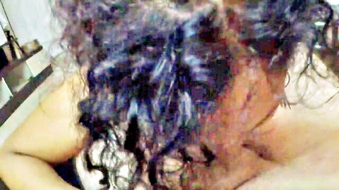 Close-up of Desi Bhabhi Lily with curly hair, bare shoulders in hot Diwali scene