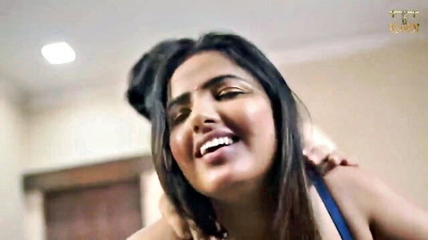 Smiling Indian babe with long dark hair in intimate desi scene